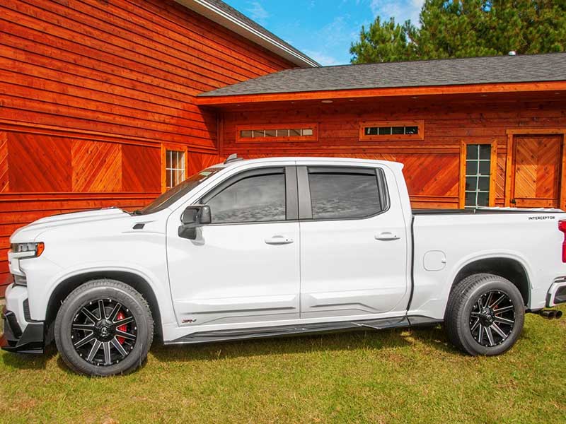 TA ZR4 Interceptor Edition parked in front of a cabin