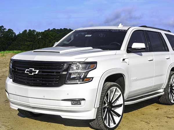 A white Tahoe Premier
