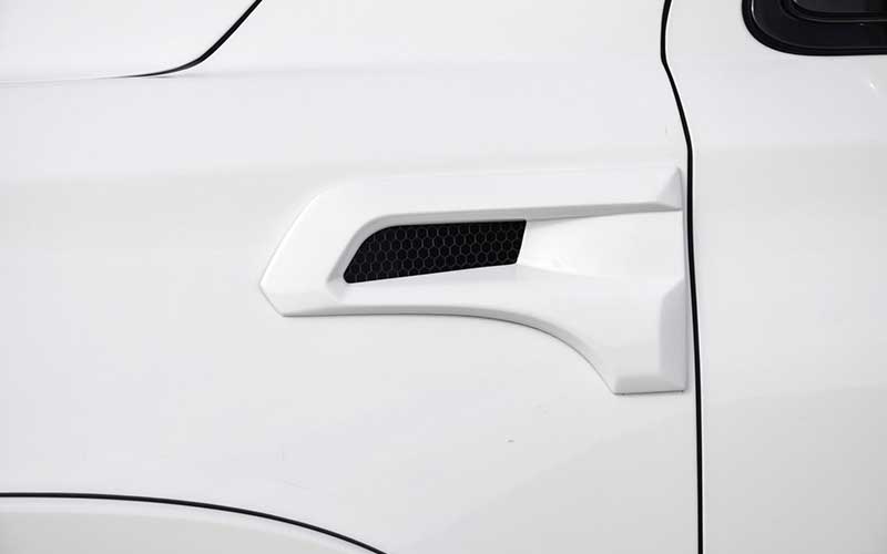 A side vent for the engine of a Tahoe Premier
